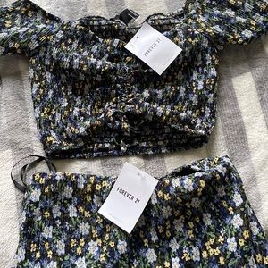 Flower skirt and crop top off the shoulder tags still on clothes